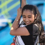 A female visitor enjoys Adventure Lookout Ropes Course at Jenkinson's Boardwalk